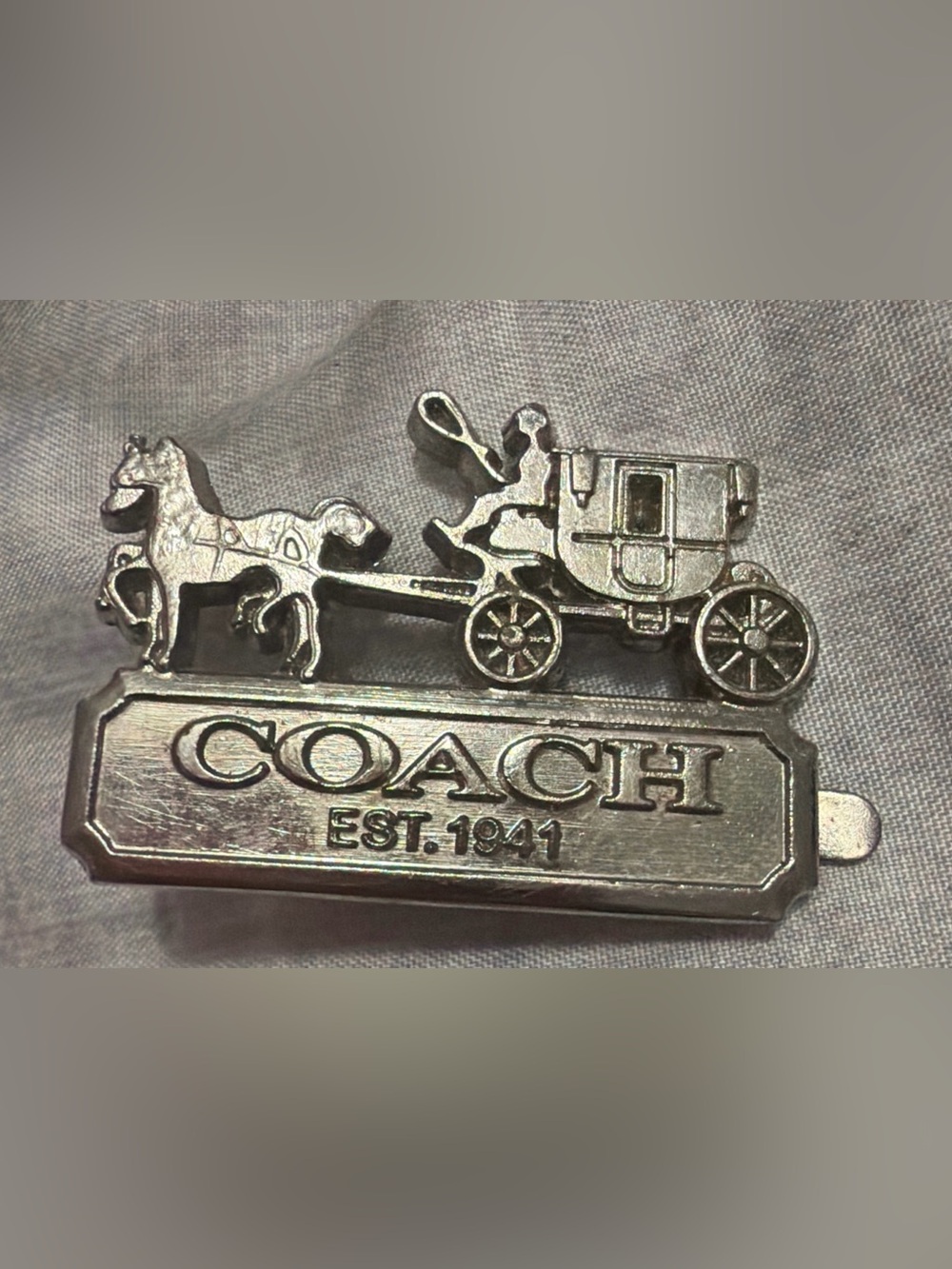 1941 silver Coach metal tag  emblem